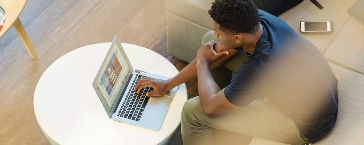 man working from home on laptop