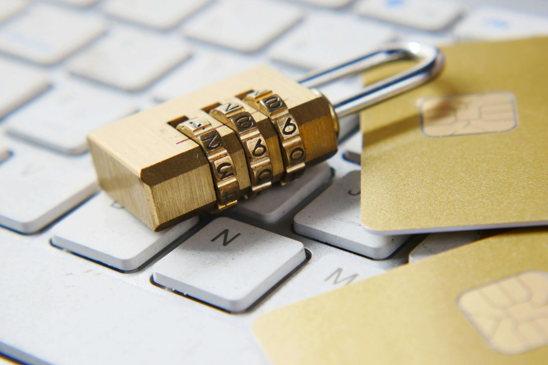 a keylock and sim cards on a keyboard